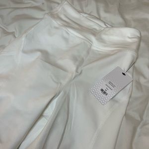 White fashion nova biker sculpt shorts, size XS, never been worn.